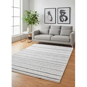 Photo of Cream Beige And Gray Striped Hand Woven Area Rug