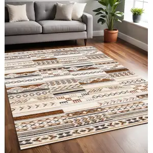 Photo of Cream Black And Brown Tribal Area Rug
