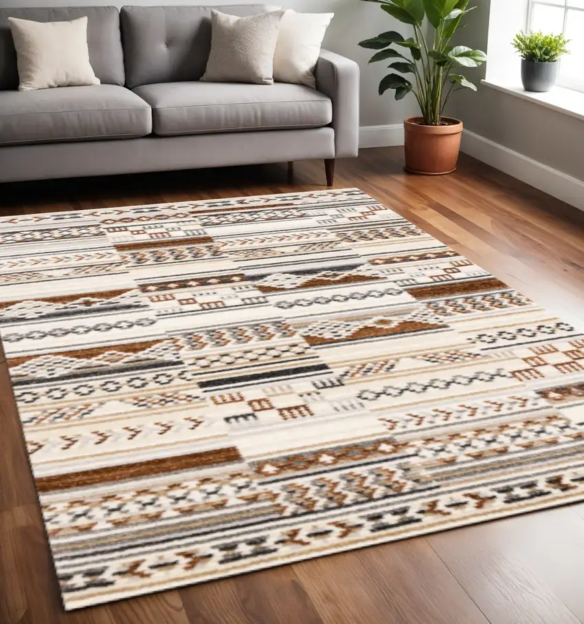 Cream Black And Brown Tribal Area Rug Photo 1