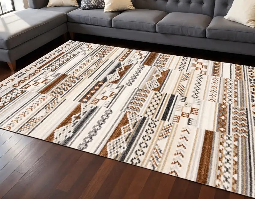 Cream Black And Brown Tribal Area Rug Photo 1