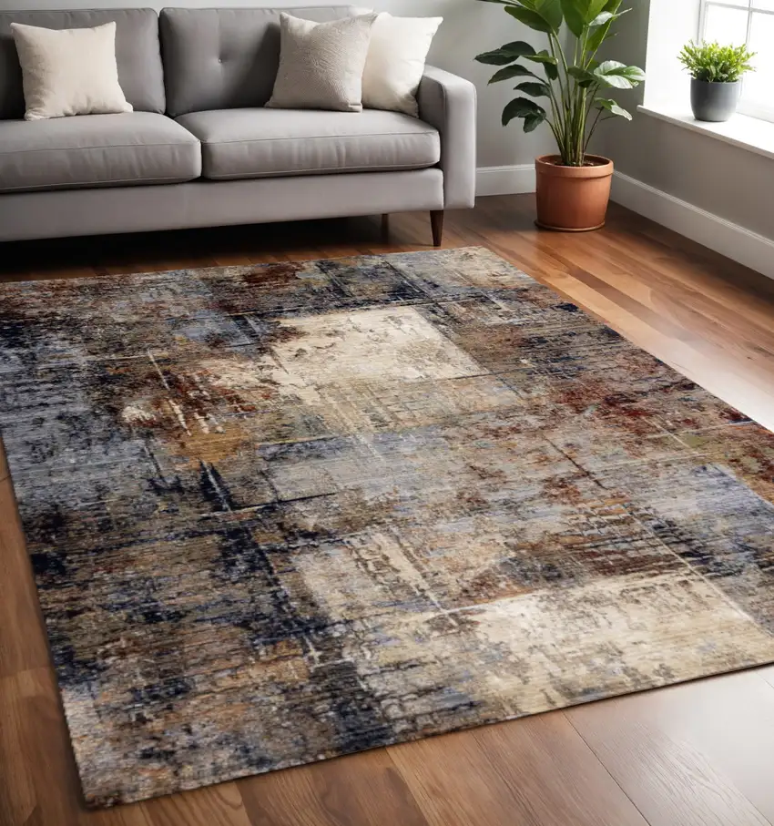 Cream Black And Tan Abstract Area Rug Photo 1