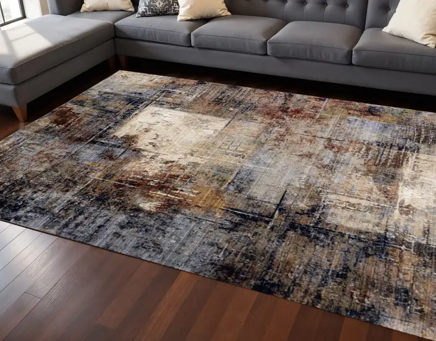 Cream Black And Tan Abstract Area Rug Photo 1
