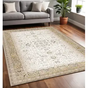 Photo of Cream Black And Tan Medallion Area Rug