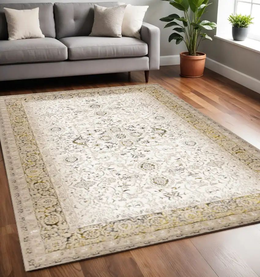 Cream Black And Tan Medallion Area Rug Photo 1