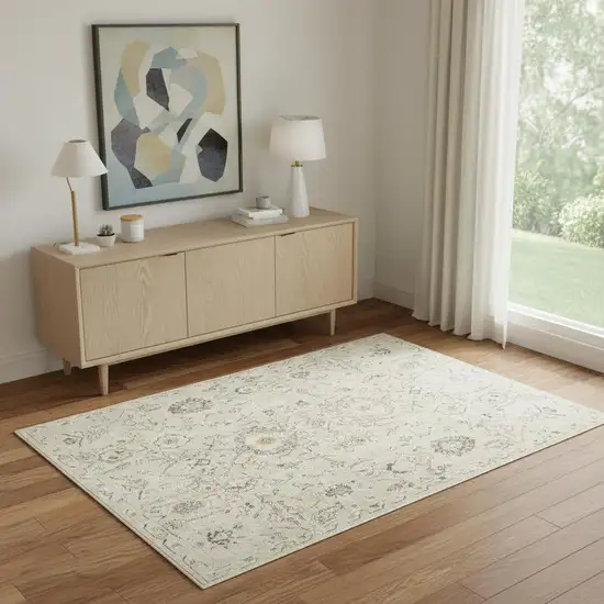 Cream Black And Yellow Floral Distressed Area Rug Photo 1