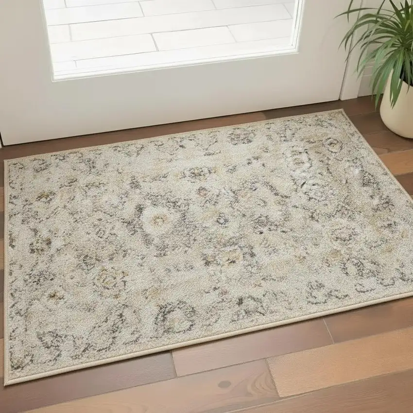Cream Black And Yellow Floral Distressed Area Rug Photo 1