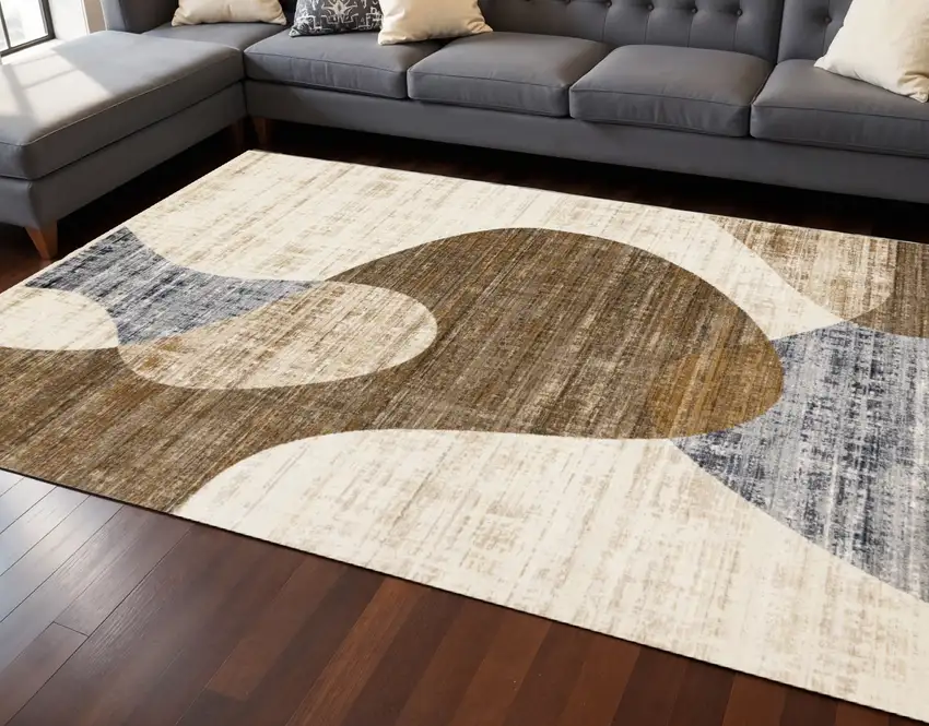 Cream Blue And Brown Abstract Area Rug Photo 1