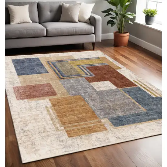 Cream Blue And Brown Geometric Area Rug Photo 1