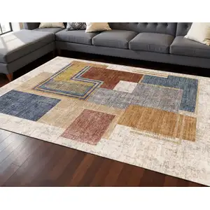 Photo of Cream Blue And Brown Geometric Area Rug