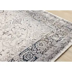 Photo of Cream Blue And Gray Medallion Area Rug