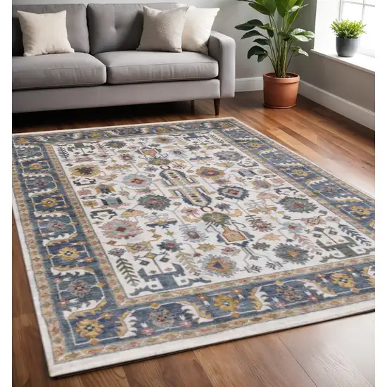 Cream Blue And Green Medallion Area Rug Photo 1