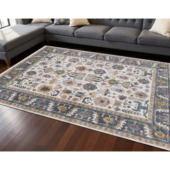 Cream Blue And Green Medallion Area Rug Photo 1