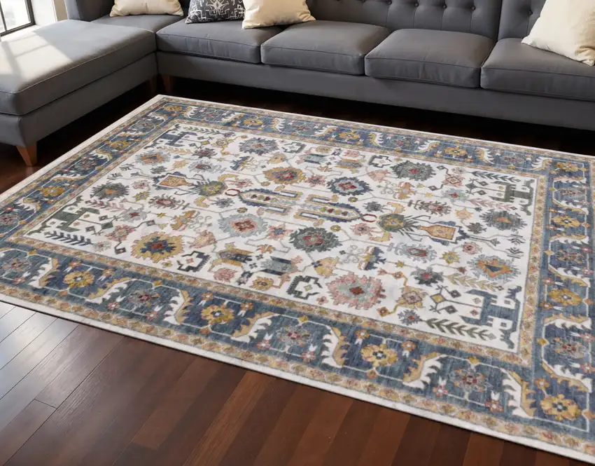 Cream Blue And Green Medallion Area Rug Photo 1