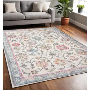 Photo of Cream Blue And Green Medallion Area Rug