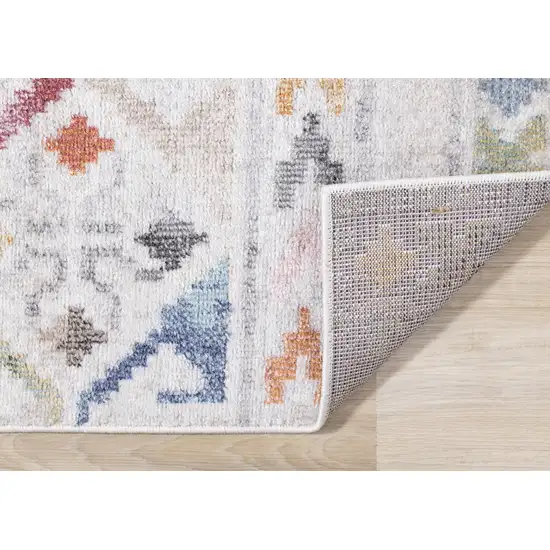 Cream Blue And Green Tribal Area Rug Photo 9