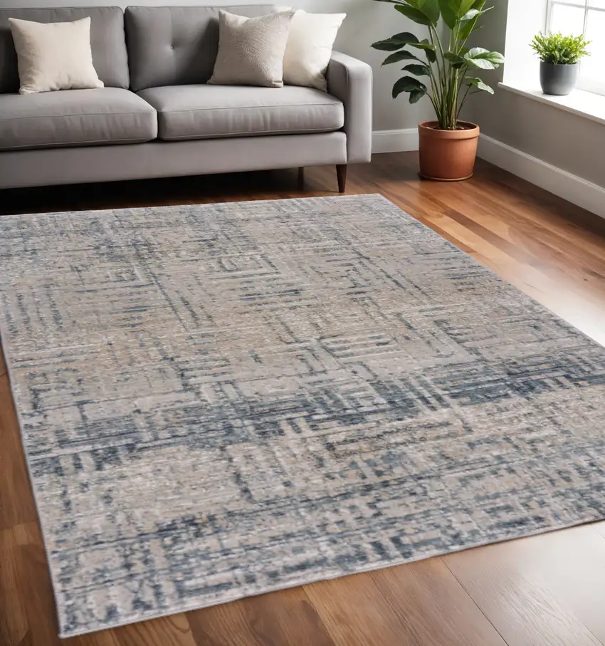 Cream Blue And Ivory Geometric Distressed Stain Resistant Area Rug Photo 1