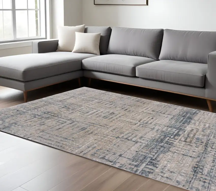 Cream Blue And Ivory Geometric Distressed Stain Resistant Area Rug Photo 1