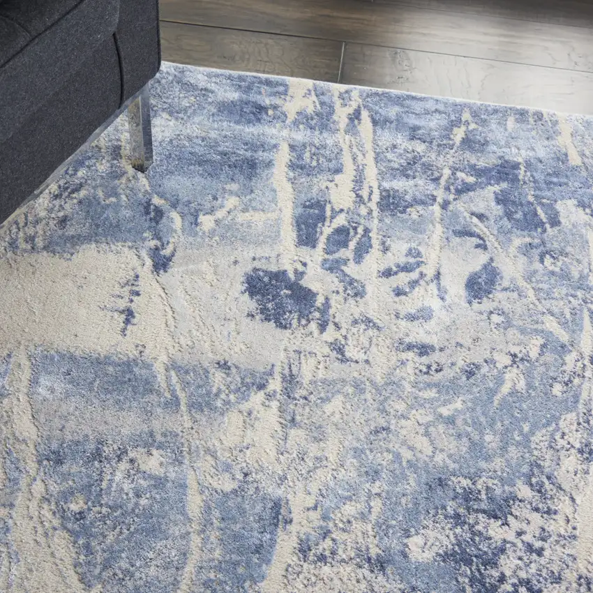 Cream Blue And Light Blue Abstract Area Rug Photo 6