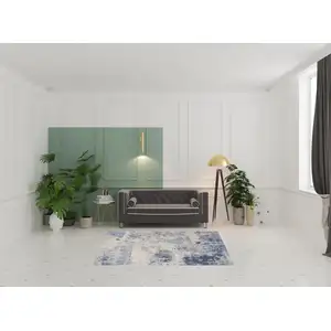 Photo of Cream Blue And Light Blue Abstract Non Skid Area Rug