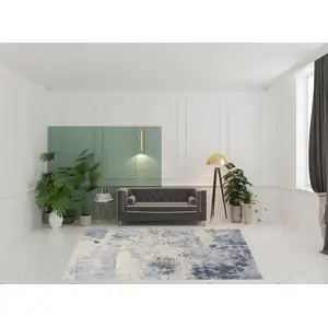 Photo of Cream Blue And Light Blue Abstract Non Skid Area Rug