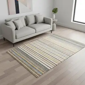 Photo of Cream Blue And Red Striped Area Rug