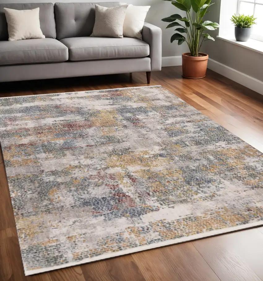 Cream Blue And Yellow Abstract Area Rug Photo 1