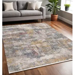 Photo of Cream Blue And Yellow Abstract Area Rug