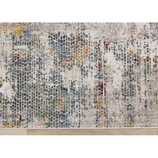 Cream Blue And Yellow Abstract Area Rug Photo 9