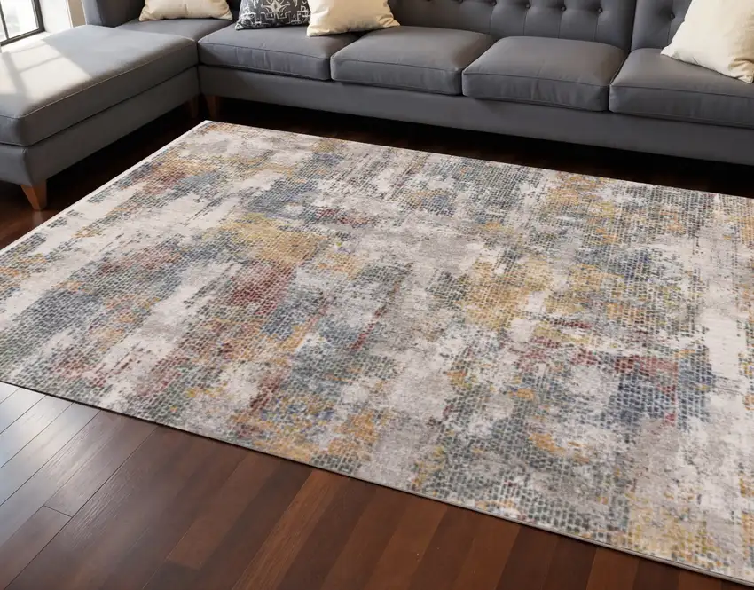 Cream Blue And Yellow Abstract Area Rug Photo 1