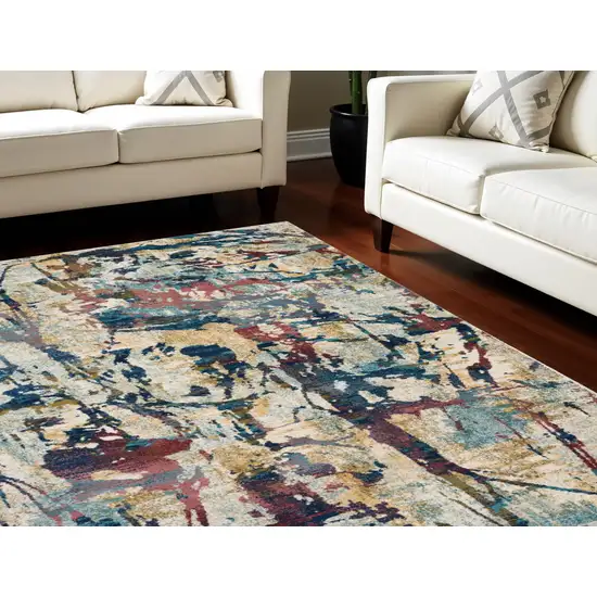 Cream Blue and Green Abstract Distressed Area Rug Photo 1