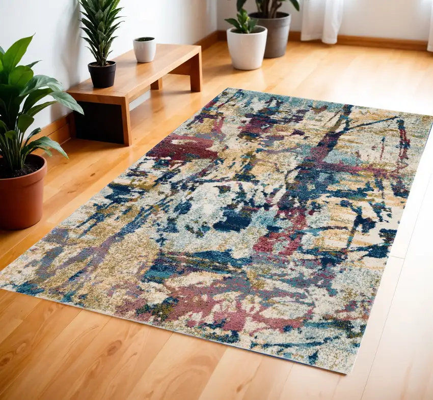 Cream Blue and Green Abstract Distressed Area Rug Photo 1