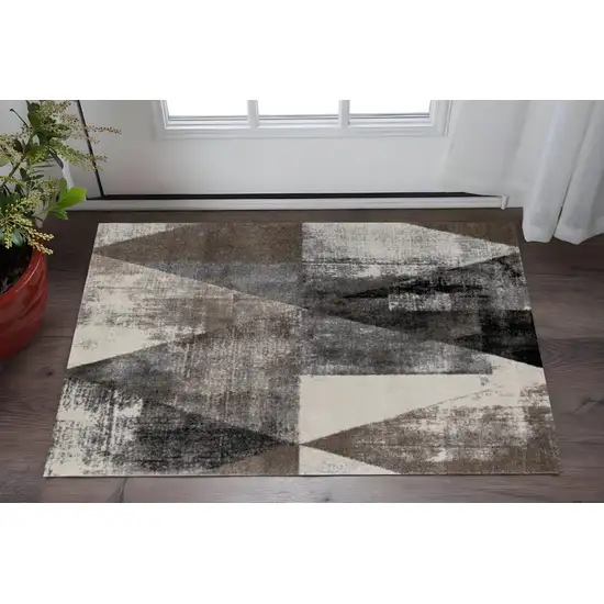 Cream Brown And Black Geometric Area Rug Photo 1
