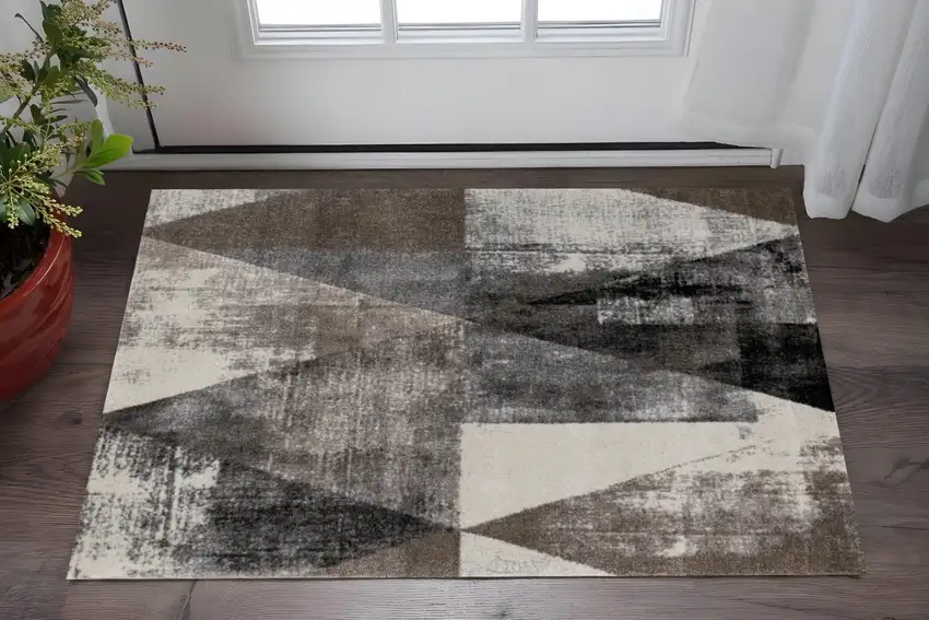 Cream Brown And Black Geometric Area Rug Photo 1