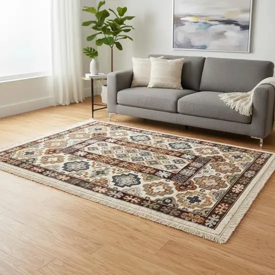Cream Brown And Tan Oriental Area Rug Photo 1