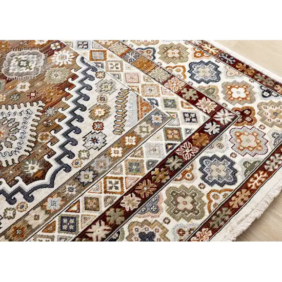 Cream Brown And Tan Oriental Area Rug Photo 8