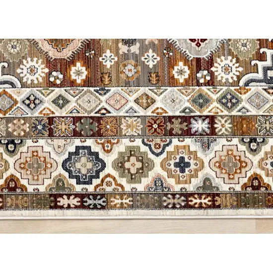 Cream Brown And Tan Oriental Area Rug Photo 9