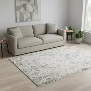 Photo of Cream Floral Distressed Area Rug