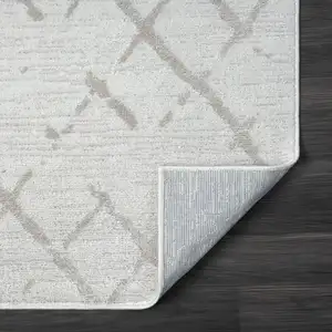 Photo of Cream Geometric Area Rug