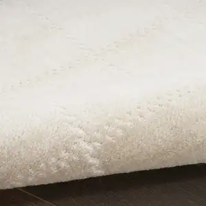 Photo of Cream Geometric Area Rug