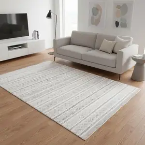 Photo of Cream Gray And Brown Geometric Hand Woven Area Rug