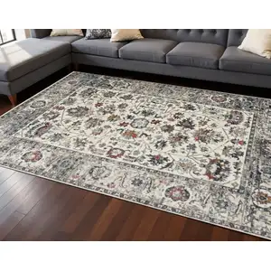 Photo of Cream Gray And Red Floral Medallion Area Rug