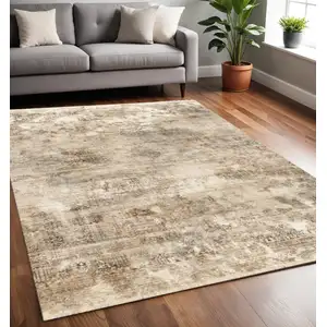 Photo of Cream Gray And Tan Abstract Area Rug