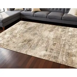 Photo of Cream Gray And Tan Abstract Area Rug