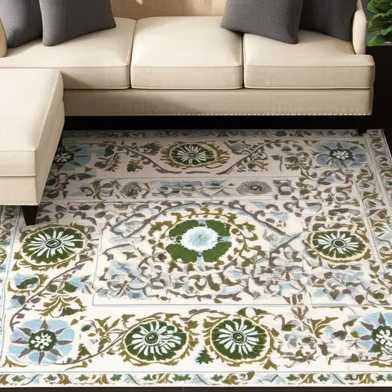 Cream Green And Blue Tribal Washable Area Rug With UV Protection Photo 1