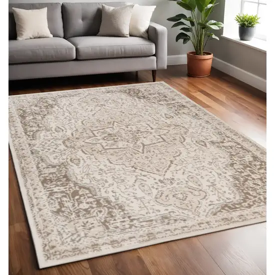 Cream And Brown Medallion Area Rug Photo 1