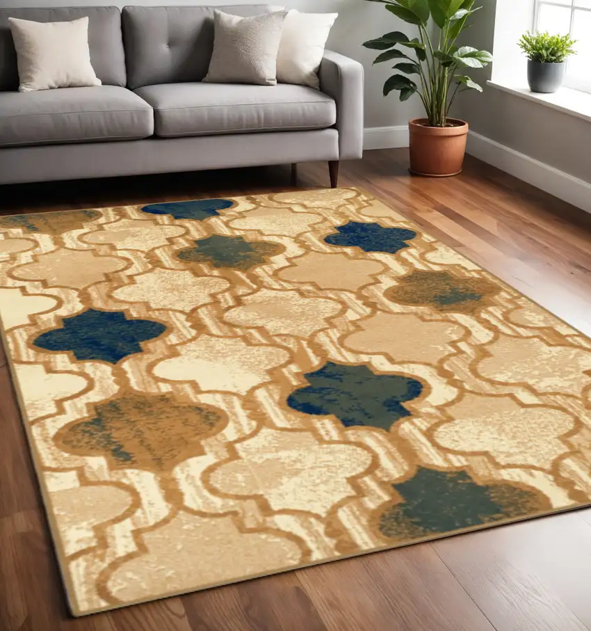 Cream Brown And Teal Quatrefoil Distressed Area Rug Photo 1