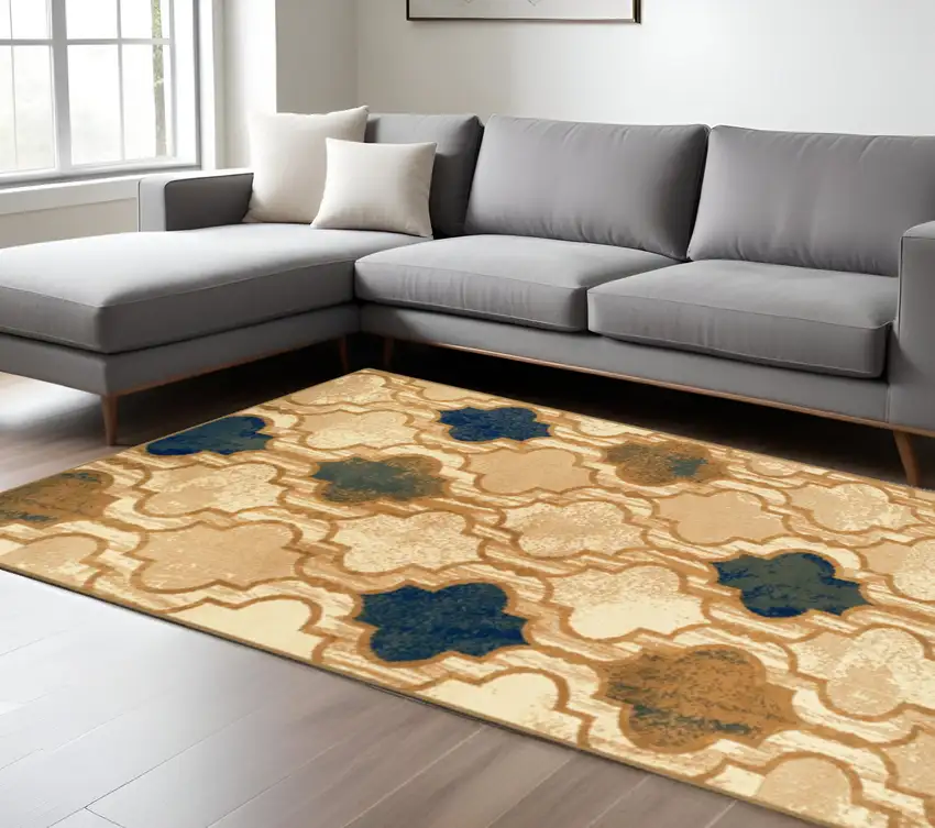 Cream Brown And Teal Quatrefoil Distressed Area Rug Photo 1