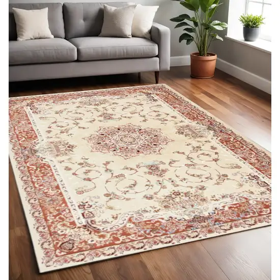 Orange and Ivory Oriental Power Loom Area Rug Photo 1