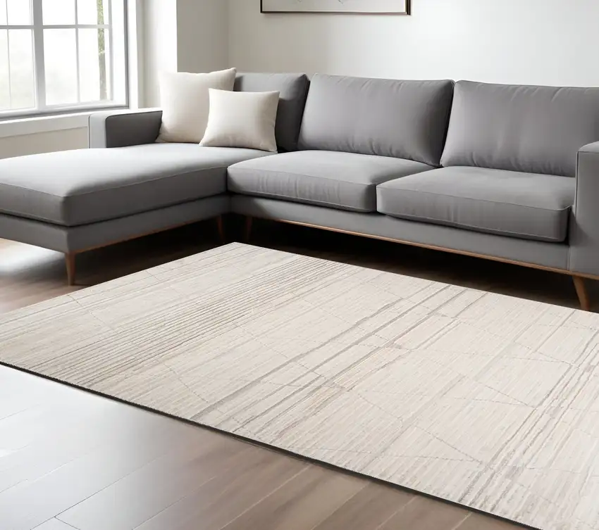 Cream and Beige Abstract Area Rug Photo 1