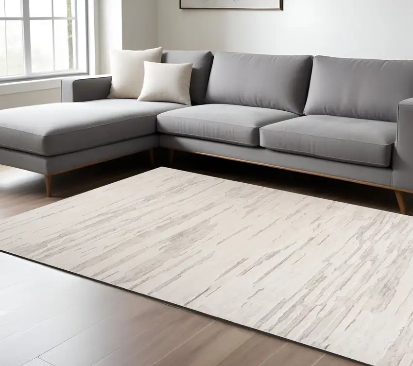 Cream and Beige Abstract Area Rug Photo 1